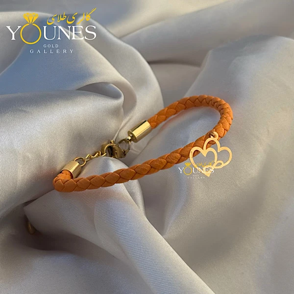 دستبند چرم نارنجی قلبی بینهایت طلا